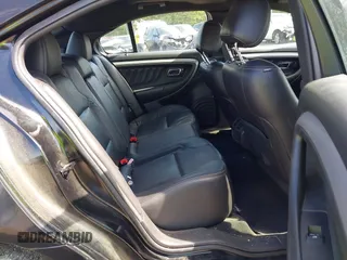 2015 Ford Taurus SEL with VIN 1FAHP2E88FG181055, listed as a IAAI auction lot 42307640 with 104,702 mi miles and . Bid and sale history available at DreamBid. Image 8.