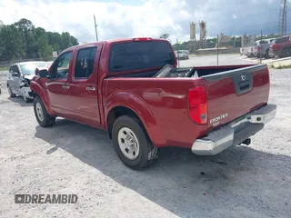 2015 Nissan Frontier SV with VIN 1N6AD0ER0FN766173, listed as a IAAI auction lot 40353766 with 116,047 mi miles and . Bid and sale history available at DreamBid. Image 3.