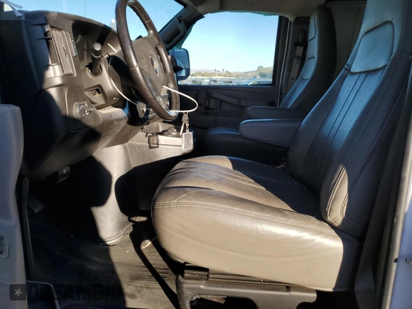 2021 Chevrolet Express Cargo with VIN 1GCWGBFP6M1268993, listed as a Copart auction lot 79764904 with 66,600 mi miles and Salvage title. Bid and sale history available at DreamBid. Image 7.
