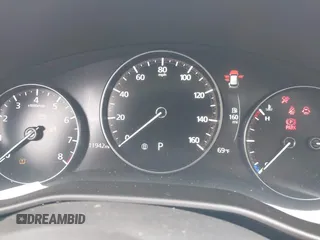 2024 Mazda CX-50 S Premium with VIN 7MMVABDM7RN187975, listed as a IAAI auction lot 42334688 with 11,942 mi miles and . Bid and sale history available at DreamBid. Image 7.