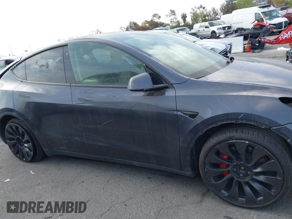 2022 Tesla Model Y Performance with VIN 7SAYGDEF7NF563433, listed as a IAAI auction lot 41713557 with Not Provided miles and . Bid and sale history available at DreamBid. Image 12.