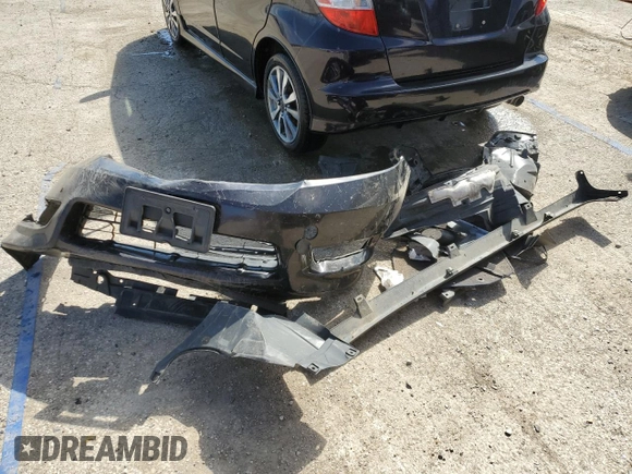 2013 Honda Fit Sport z VIN JHMGE8H68DC053863, wystawiony jako Copart lot #52140945 z przebiegiem Nie podano mil oraz Szkoda całkowita • Salvage title. Historia ofert i sprzedaży dostępna na DreamBid. Obrazek 12.