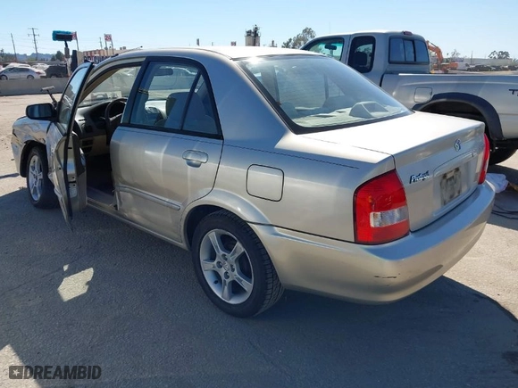 2003 Mazda Protege LX with VIN JM1BJ226330154838, listed as a IAAI auction lot 41854918 with NaN miles. Bid and sale history available at carsss.com. Image 3.