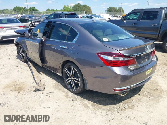 2017 Honda Accord Touring with VIN 1HGCR3F97HA041159, listed as a IAAI auction lot 42205195 with Not provided miles and . Bid and sale history available at DreamBid. Image 3.
