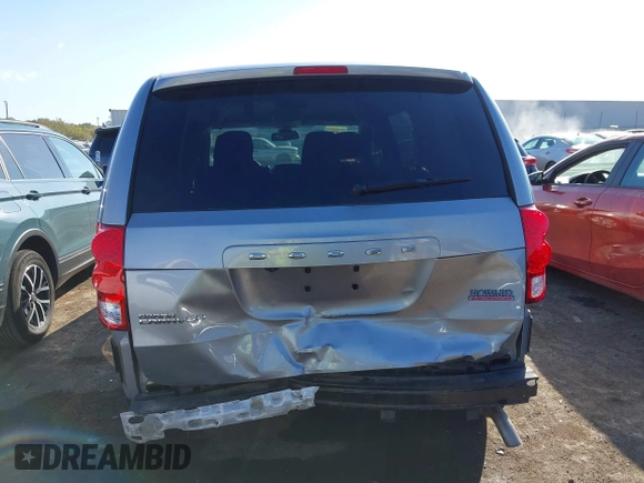 2020 Dodge Grand Caravan SE with VIN 2C4RDGBG9LR198425, listed as a IAAI auction lot 40672143 with 61,473 mi miles and . Bid and sale history available at DreamBid. Image 16.