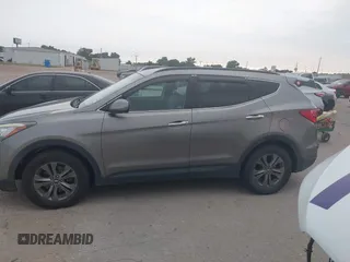 2016 Hyundai Santa Fe z VIN 5XYZU3LB3GG370826, wystawiony jako IAAI lot #42325158 z przebiegiem 146 916 mil mil oraz . Historia ofert i sprzedaży dostępna na DreamBid. Obrazek 14.