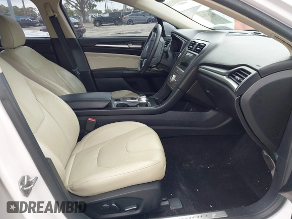 2017 Ford Fusion Titanium with VIN 3FA6P0K99HR272713, listed as a IAAI auction lot 41757334 with 104,733 mi miles. Bid and sale history available at carsss.com. Image 5.