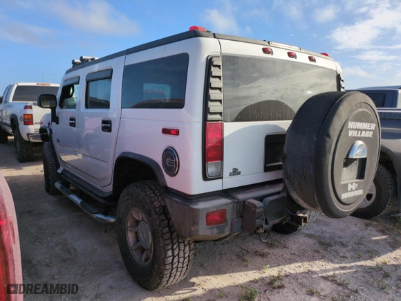 2006 Hummer H2 with VIN 5GRGN23U26H121003, listed as a Copart auction lot 74844994 with 0 mi miles and Salvage Title. Bid and sale history available at carsss.com. Image 2.