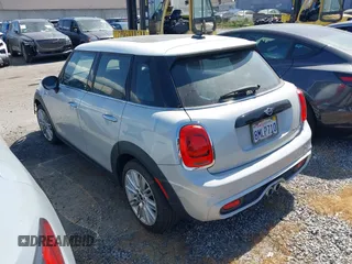2019 MINI Hardtop 4 Door Cooper S with VIN WMWXU3C54K2H88672, listed as a IAAI auction lot 42227589 with 6,203 mi miles and . Bid and sale history available at DreamBid. Image 3.