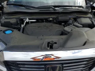 2023 Honda Ridgeline RTL-E with VIN 5FPYK3F70PB018858, listed as a Copart auction lot 64210205 with 16,562 mi miles and Salvage title. Bid and sale history available at DreamBid. Image 11.