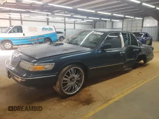 1997 Mercury Grand Marquis GS z VIN 2MELM74W2VX631669, wystawiony jako Copart lot #52571175 z przebiegiem 159 811 mil mil oraz Szkoda całkowita • Salvage title. Historia ofert i sprzedaży dostępna na DreamBid. Obrazek 1.