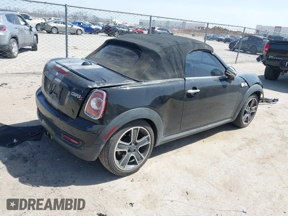 2012 MINI Roadster S with VIN WMWSY3C56CT144520, listed as a IAAI auction lot 41818205 with 86,836 mi miles and . Bid and sale history available at DreamBid. Image 4.