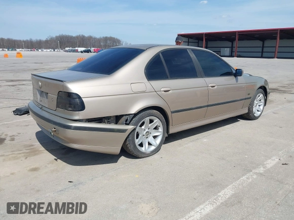 2000 BMW 5 Series 528i with VIN WBADM6348YGV00883, listed as a IAAI auction lot 41898075 with 175,137 mi miles and . Bid and sale history available at DreamBid. Image 4.