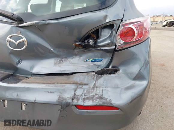 2012 Mazda Mazda3 i Touring with VIN JM1BL1L84C1671872, listed as a IAAI auction lot 42116842 with 85,343 mi miles. Bid and sale history available at carsss.com. Image 15.
