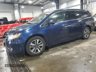 2014 Honda Odyssey Touring with VIN 5FNRL5H99EB131208, listed as a Copart auction lot 60627445 with 182,280 mi miles and Salvage title. Bid and sale history available at DreamBid. Image 1.