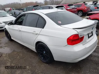 2007 BMW 3 Series 328i with VIN WBAVA335X7P141314, listed as a IAAI auction lot 41773135 with 131,955 mi miles. Bid and sale history available at carsss.com. Image 3.