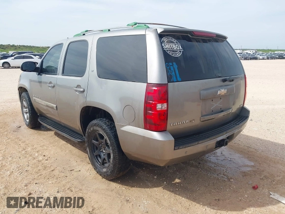 2009 Chevrolet Tahoe 2LT z VIN 1GNEC23369R181474, wystawiony jako IAAI lot #42222270 z przebiegiem 259 621 mil mil oraz . Historia ofert i sprzedaży dostępna na DreamBid. Obrazek 3.