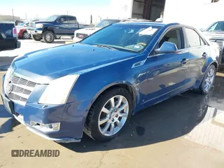 2009 Cadillac CTS RWD with VIN 1G6DV57V990146995, listed as a IAAI auction lot 41209631 with 172,229 mi miles and . Bid and sale history available at carsss.com. Image 2.