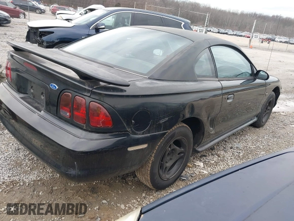 1997 Ford Mustang with VIN 1FALP4041VF129619, listed as a IAAI auction lot 41440766 with 135,934 mi miles. Bid and sale history available at carsss.com. Image 4.