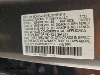 2024 Honda Pilot EX-L 7 Passenger with VIN 5FNYG2H58RB007819, listed as a Copart auction lot 77101344 with 2,829 mi miles and Salvage Title. Bid and sale history available at carsss.com. Image 12.