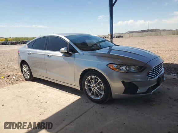 2020 Ford Fusion SE with VIN 3FA6P0HD3LR127008, listed as a Copart auction lot 54830665 with 122,179 mi miles and Salvage title. Bid and sale history available at DreamBid. Image 4.