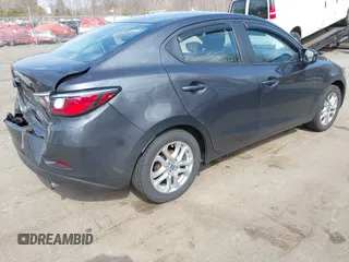 2016 Scion iA with VIN 3MYDLBZV2GY129703, listed as a IAAI auction lot 41787371 with 77,459 mi miles. Bid and sale history available at carsss.com. Image 4.
