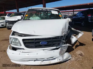 1999 Ford F-150 Work Series with VIN 1FTRF17W0XKA35108, listed as a IAAI auction lot 41383313 with 1 mi miles. Bid and sale history available at carsss.com. Image 12.