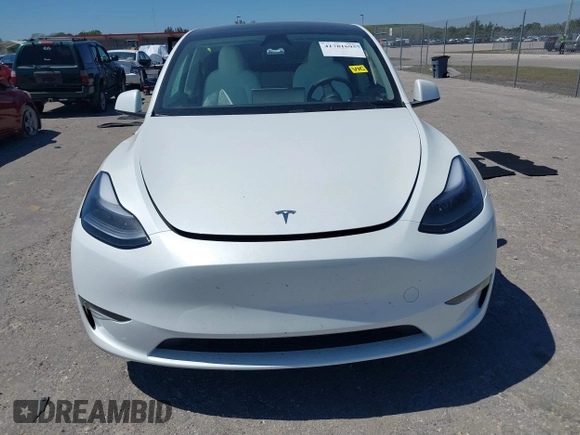 2025 Tesla Model Y Long Range with VIN 7SAYGDED6SF234278, listed as a IAAI auction lot 41781695 with 1,168 mi miles and . Bid and sale history available at DreamBid. Image 11.