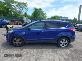 2016 Ford Escape SE z VIN 1FMCU9GX0GUA76647, wystawiony jako IAAI lot #42314233 z przebiegiem 86 010 mil mil oraz . Historia ofert i sprzedaży dostępna na DreamBid. Obrazek 15.