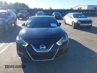 2016 Nissan Maxima SV with VIN 1N4AA6AP0GC385090, listed as a IAAI auction lot 41215857 with 97,072 mi miles and . Bid and sale history available at DreamBid. Image 12.