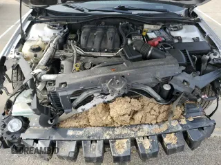 2011 Mercury Milan Premier with VIN 3MEHM0JG9BR605834, listed as a Copart auction lot 50241845 with 121,148 mi miles and Salvage title. Bid and sale history available at DreamBid. Image 12.