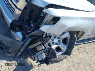 2016 Chevrolet Tahoe LTZ with VIN 1GNSKCKC1GR452600, listed as a IAAI auction lot 42305719 with 121,041 mi miles and . Bid and sale history available at DreamBid. Image 6.