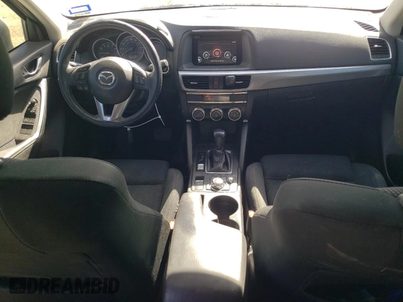 2016 Mazda CX-5 Touring with VIN JM3KE2CY7G0657113, listed as a Copart auction lot 46489835 with 166,399 mi miles and Salvage Title. Bid and sale history available at DreamBid. Image 8.