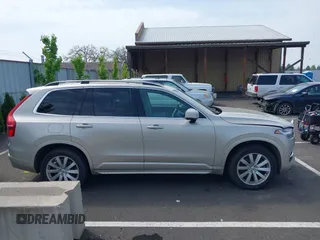 2016 Volvo XC90 T6 Momentum with VIN YV4A22PK7G1038750, listed as a IAAI auction lot 42128057 with 124,112 mi miles. Bid and sale history available at carsss.com. Image 13.