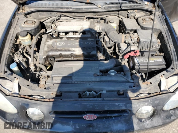 2001 Kia Spectra GS z VIN KNAFB161115036033, wystawiony jako Copart lot #55939335 z przebiegiem 76 414 mil mil oraz Szkoda całkowita • Salvage title. Historia ofert i sprzedaży dostępna na DreamBid. Obrazek 11.