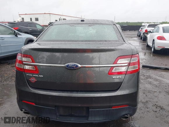 2018 Ford Taurus SEL z VIN 1FAHP2E85JG101221, wystawiony jako IAAI lot #42242127 z przebiegiem 123 787 mil mil oraz . Historia ofert i sprzedaży dostępna na DreamBid. Obrazek 17.