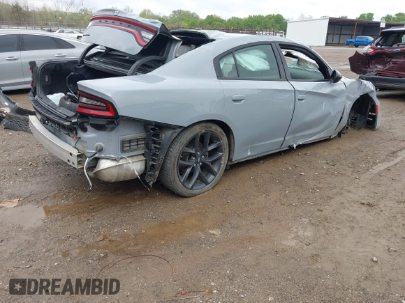 2022 Dodge Charger SXT with VIN 2C3CDXBGXNH145896, listed as a IAAI auction lot 42010378 with 24,561 mi miles and . Bid and sale history available at DreamBid. Image 4.