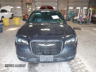 2015 Chrysler 300 with VIN 2C3CCAGG9FH864678, listed as a IAAI auction lot 41812118 with 107,873 mi miles. Bid and sale history available at carsss.com. Image 13.