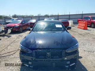 2024 BMW i4 xDrive40 z VIN WBY83FB05RFS37070, wystawiony jako IAAI lot #41975207 z przebiegiem 8 304 mil mil oraz . Historia ofert i sprzedaży dostępna na DreamBid. Obrazek 13.
