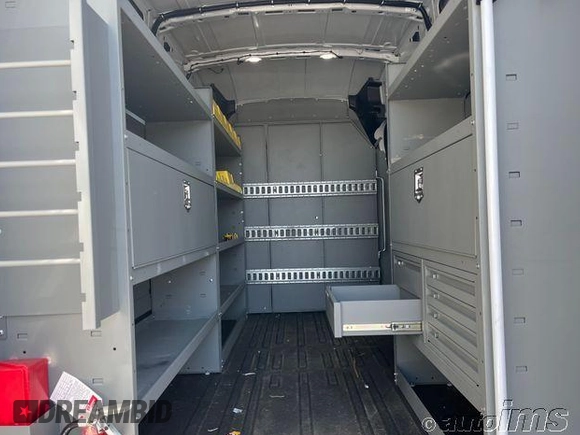 2023 Ford Transit Cargo with VIN 1FTBR1X82PKC02353, listed as a IAAI auction lot 42878842 with 25,863 mi miles and . Bid and sale history available at DreamBid. Image 2.
