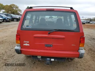 1999 Jeep Cherokee Sport with VIN 1J4FT68S2XL580915, listed as a Copart auction lot 50374875 with 286,276 mi miles and Salvage Title. Bid and sale history available at carsss.com. Image 6.