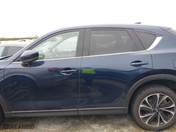2022 Mazda CX-5 2.5 S Premium Package with VIN JM3KFBDMXN1618807, listed as a IAAI auction lot 40476313 with NaN miles. Bid and sale history available at carsss.com. Image 14.