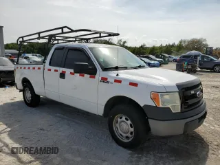 2014 Ford F-150 XL with VIN 1FTEX1CM1EFC16837, listed as a Copart auction lot 53352665 with 191,792 mi miles and Salvage title. Bid and sale history available at DreamBid. Image 4.