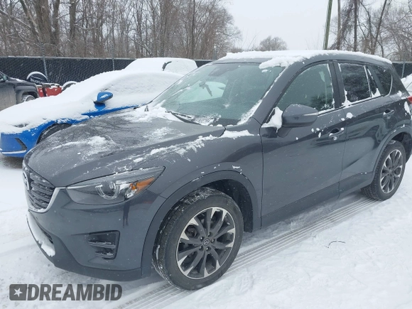 2016 Mazda CX-5 Grand Touring with VIN JM3KE4DY2G0913412, listed as a IAAI auction lot 41616132 with 85,166 mi miles. Bid and sale history available at carsss.com. Image 17.