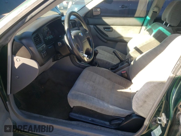 2000 Subaru Legacy L with VIN 4S3BE6352Y6214274, listed as a Copart auction lot 77827604 with 117,520 mi miles and Salvage title. Bid and sale history available at DreamBid. Image 7.