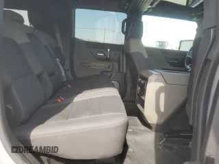 2024 GMC Hummer EV 2X z VIN 1GKB0NDE8RU106525, wystawiony jako Copart lot #54308665 z przebiegiem 4762 mil mil oraz Szkody całkowita. Historia ofert i sprzedaży dostępna na DreamBid. Obrazek 11.