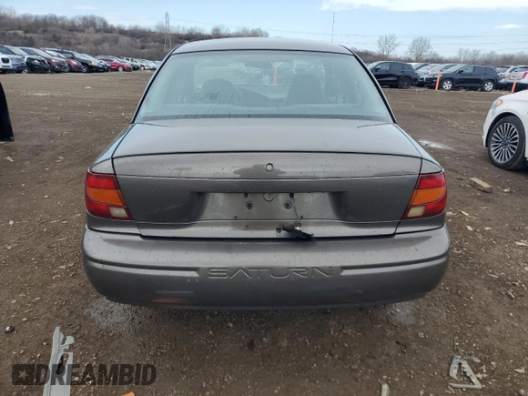 2000 Saturn SL with VIN 1G8ZH528XYZ217346, listed as a Copart auction lot 51164695 with 94,076 mi miles and Salvage title. Bid and sale history available at DreamBid. Image 6.