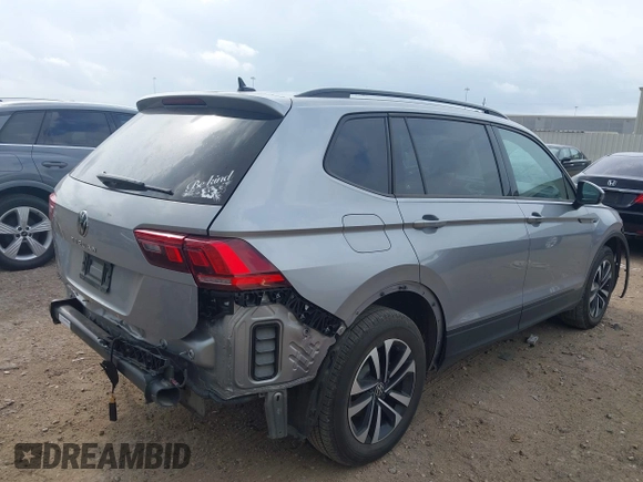 2023 Volkswagen Tiguan S with VIN 3VVRB7AX4PM015440, listed as a IAAI auction lot 42132705 with 37,482 mi miles and . Bid and sale history available at DreamBid. Image 4.
