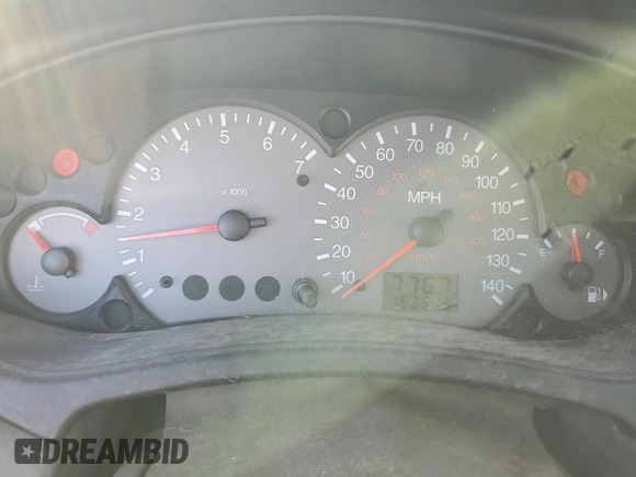 2003 Ford Focus ZTS with VIN 1FAFP38333W249101, listed as a Copart auction lot 77824534 with 163,513 mi miles and Salvage Title. Bid and sale history available at carsss.com. Image 9.