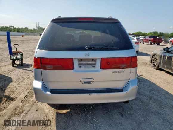 2001 Honda Odyssey EX with VIN 2HKRL18641H619203, listed as a Copart auction lot 59329555 with 180,058 mi miles and Clean title. Bid and sale history available at DreamBid. Image 6.